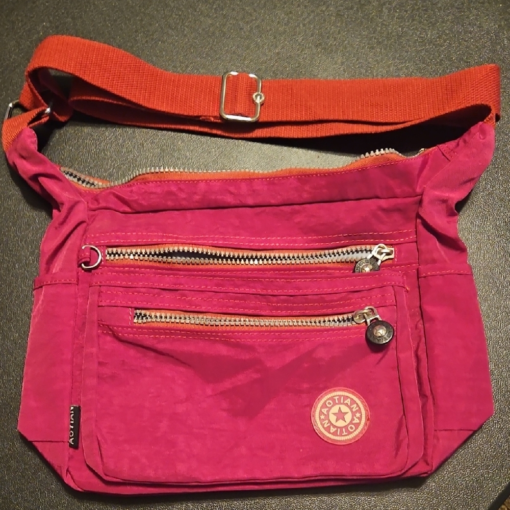 Vibrant Pink Shoulder Bag with Metallic Accents